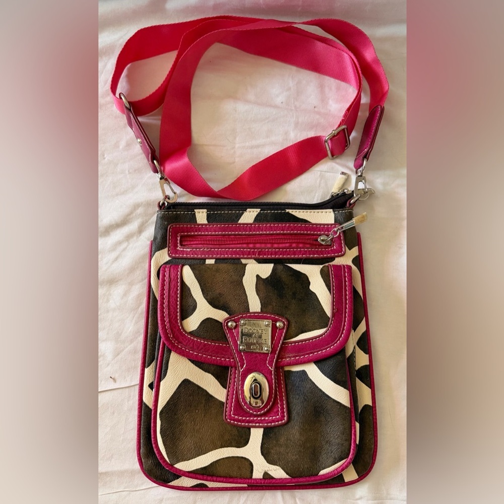 Dooney & Bourke Crossbody Giraffe print with PInk Leather trim. Good Cons